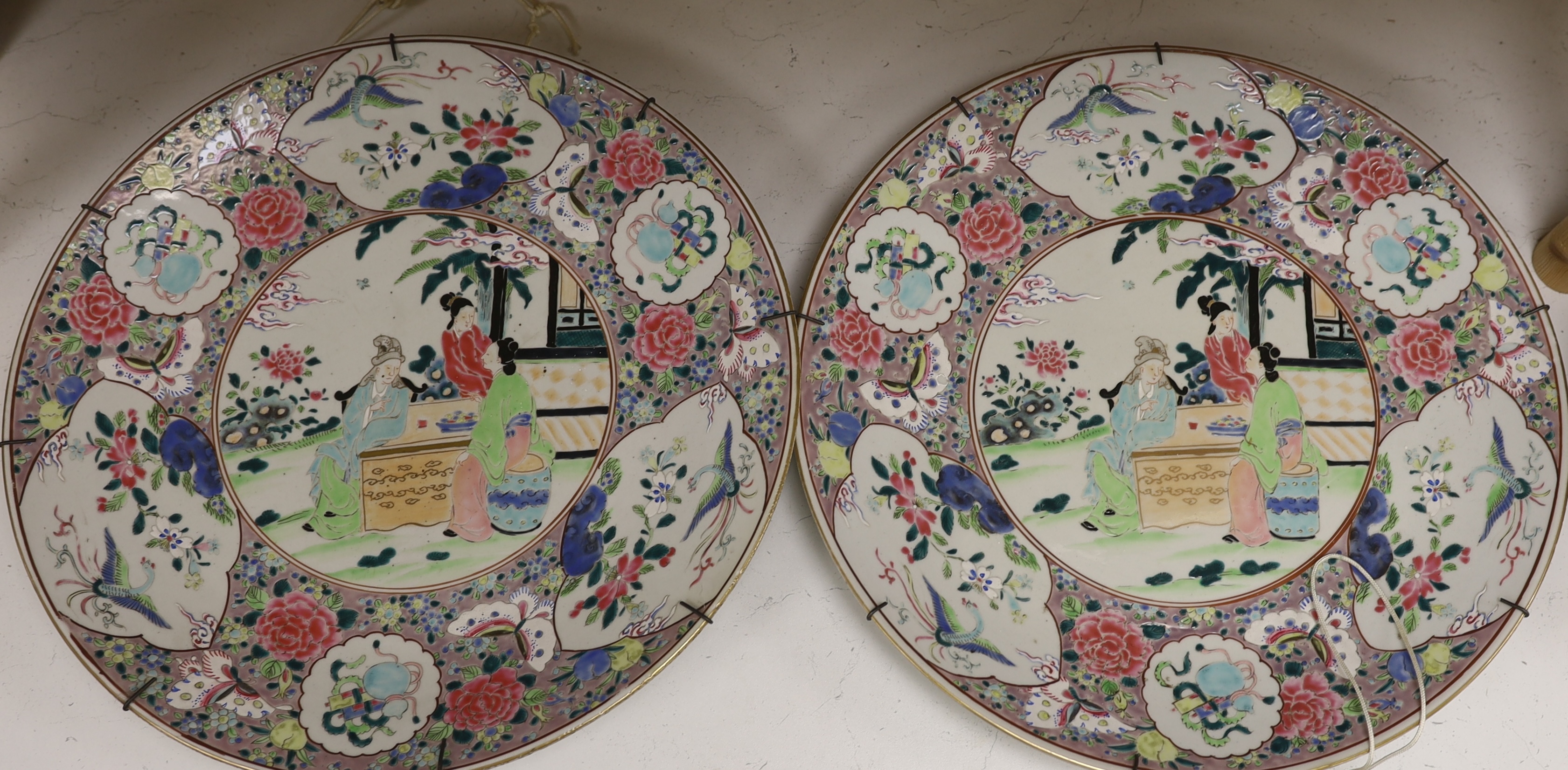 A pair of early 20th century Japanese porcelain chargers, 46cm diameter. Condition - good